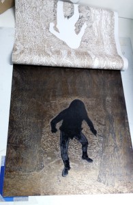 Peeling away paper from plate